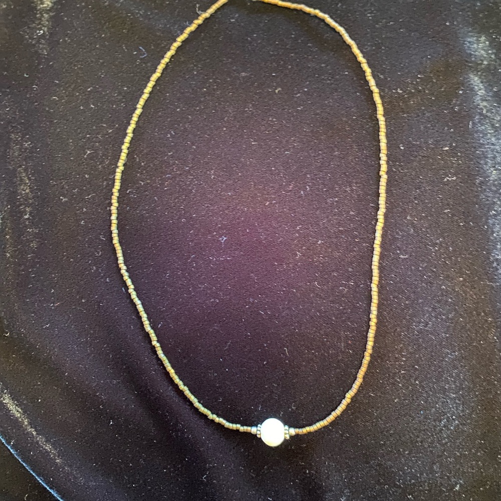 Choker necklace- small brown beads with center Pearl-like bead.